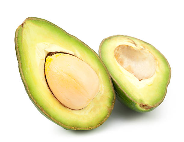 istock two slices of avocado isolated 617386978