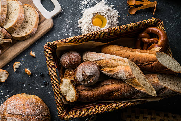 istock Freshly baked bread on wooden table 617388234