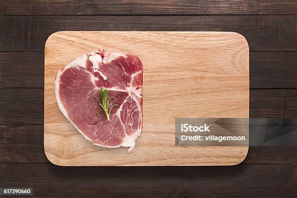 Top View Raw Pork Chop Steak On Cutting Board Stock Photo - Download Image Now - Block Shape, Butcher's Shop, Textured