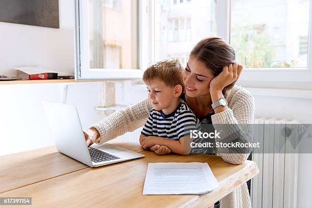 Working With Mommy Stock Photo - Download Image Now - Mother, Child, Family