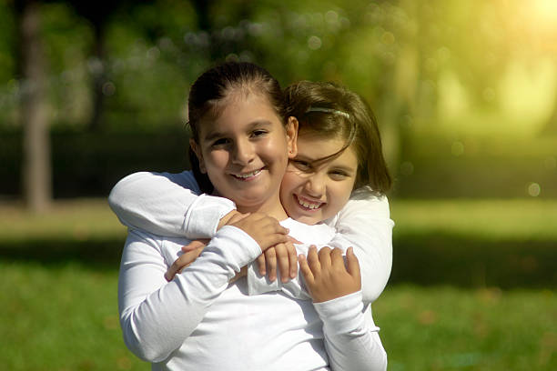 istock two happy kid girl 617392520