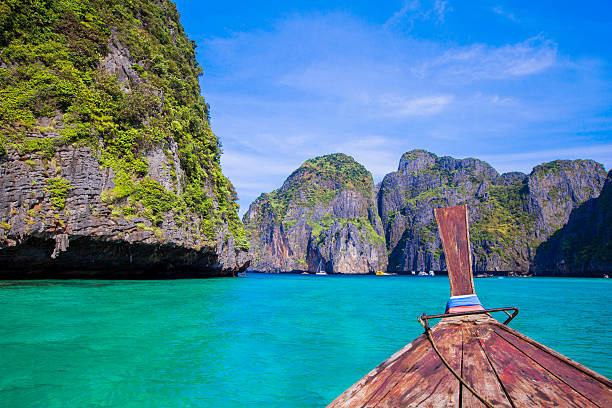 istock Longtail boat in sea 617392880