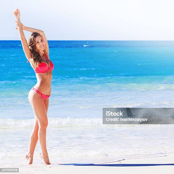 Woman At Sea Beach Stock Photo - Download Image Now - Summer, Beach, Bikini