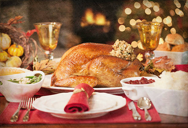istock Thanksgiving Christmas Elegant Holiday Turkey Dinner and Christmas Tree 617392996