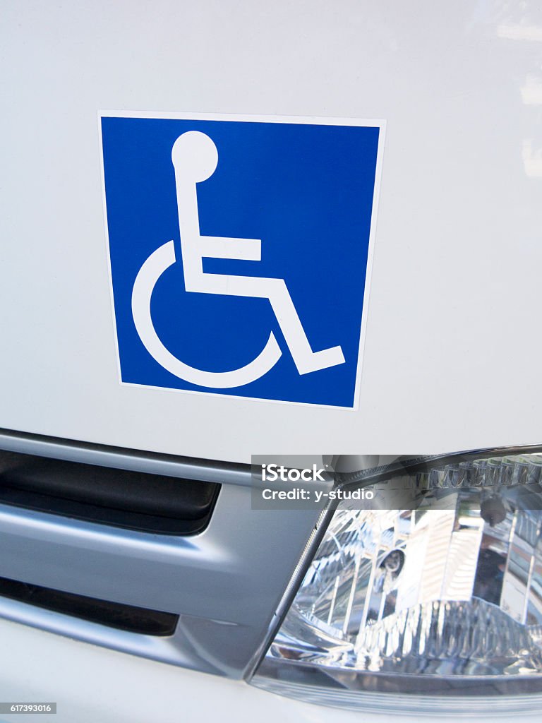 Disabled sticker on a car Bumper Sticker Stock Photo