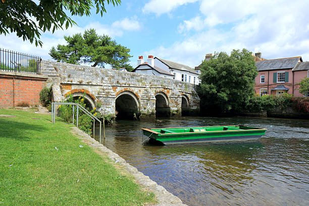 Small bridge over the river Avon in Christchurch Small bridge over the river Avon in Christchurch christchurch england photos stock pictures, royalty-free photos & images