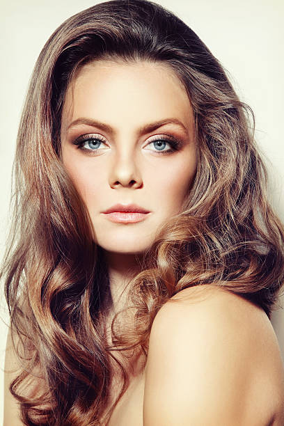 istock Girl with curly hair 617395618