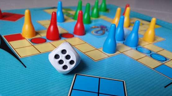 Board game - chinese, colorful pawns and dice