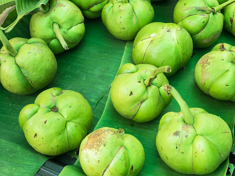 Elephant apple or chalta of south east asia on banana leaf.