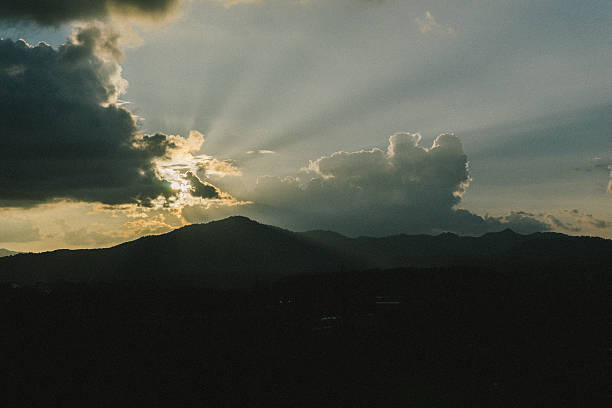 istock background for sunset silhouette mountain and film effect 617564200