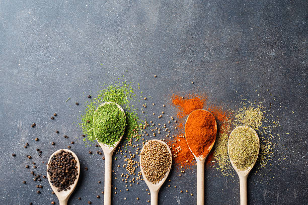 istock Herbs and spices on gray stone table 617564842