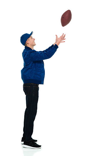 istock Male throwing a ball 617565044