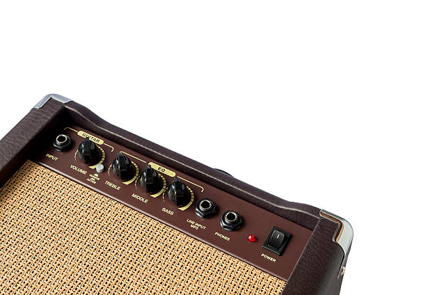 istock Small acoustic guitar amplifier isolated on white background 617565338
