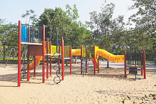 istock Colorful playground in the park 617565686