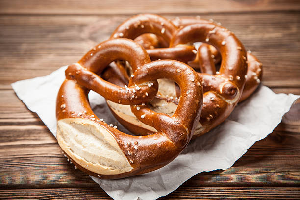 istock Pretzels on wooden table 617567178