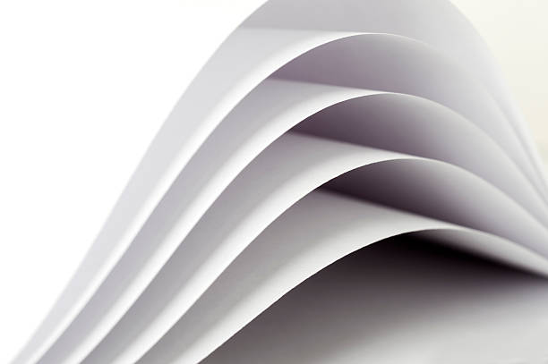 istock curved sheets of white paper 617569240