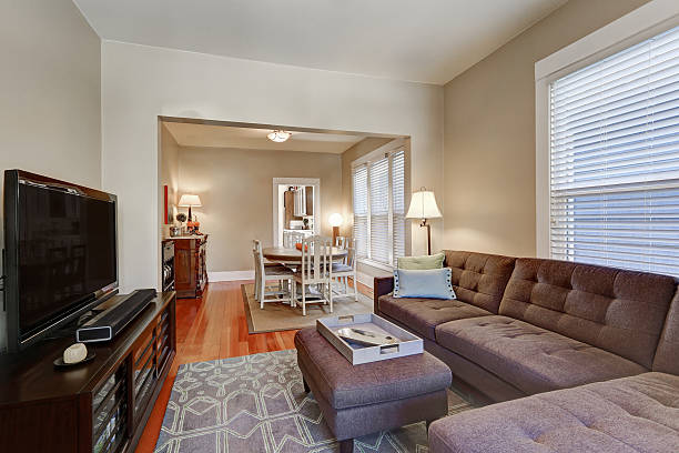 istock American living room interior with brown corner sofa 617570796