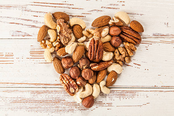 istock Mix of different nuts closeup photo 617572342