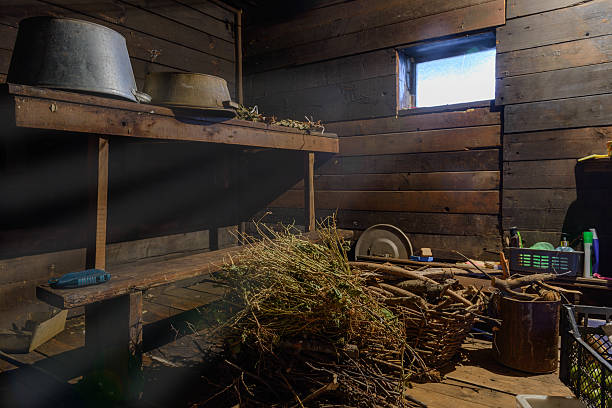istock scattered things in a wooden shed with window 617574892