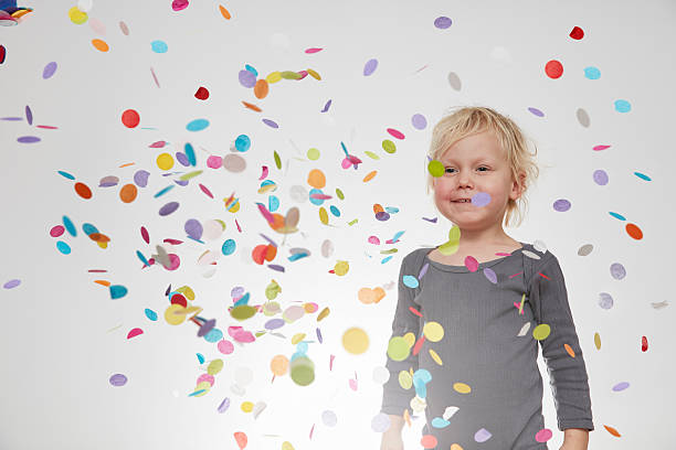 istock Girl and confetti 617578412