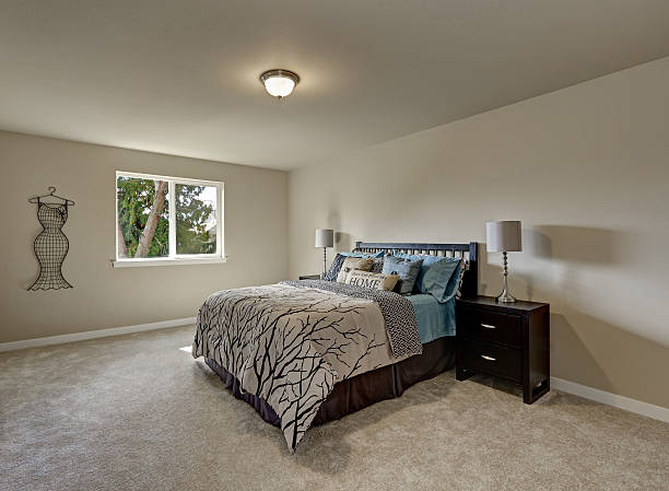 istock Simple design interior of beige Woman's bedroom 617578456