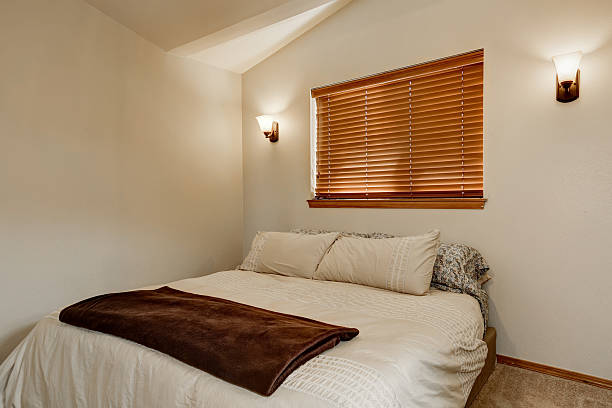 istock Light tones bedroom interior with carpet floor 617579626