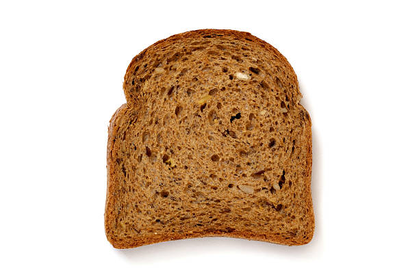 istock Slice of wholewheat bread on white background 617581034