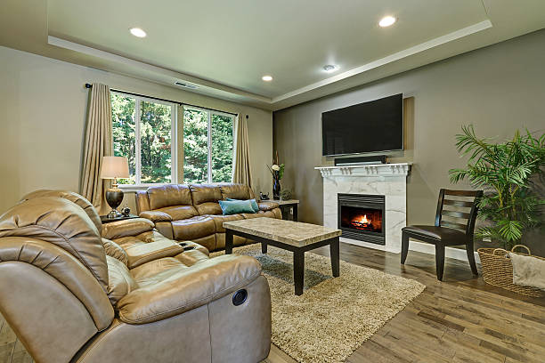 istock Gray and brown family room interior 617581228