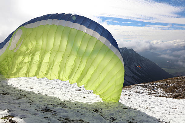 istock Paraglider at Nebelhorn in Oberstdorf. Bavaria. Germany 617581394