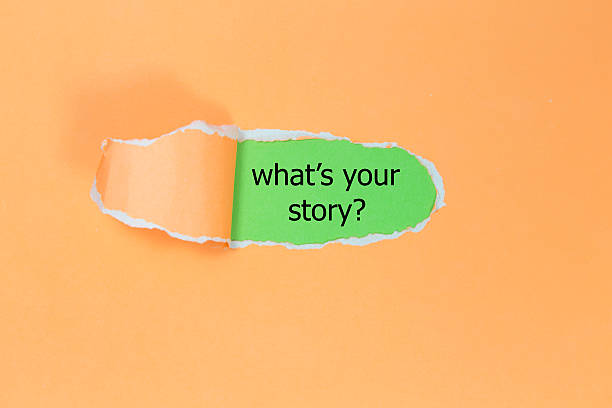istock Text 'What's your story?' appears under the torn paper. 617582236