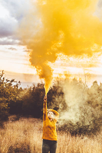 istock Girl playing with smoke 617582468