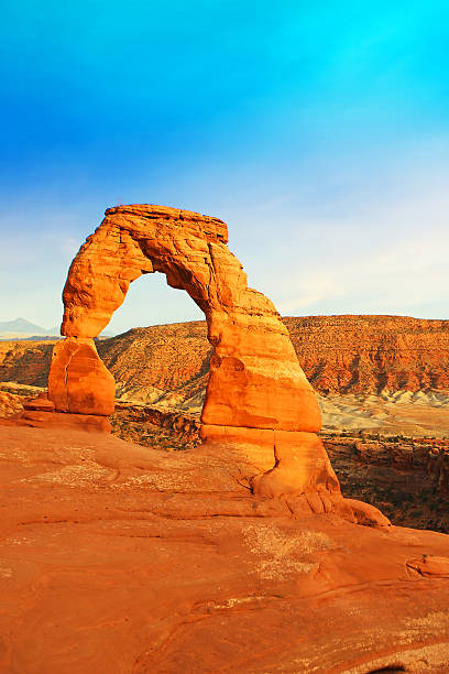 istock Delicate Arch in Arches National Park against Moody Sky 617582792