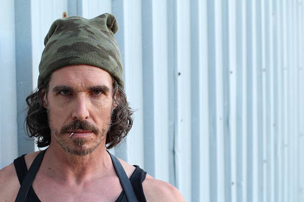 istock Sea Captain Wearing A Camouflage Beanie 617582846