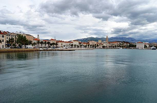 istock Bay and Cityscape with Threatening Clouds, Split, Croatia 617585318
