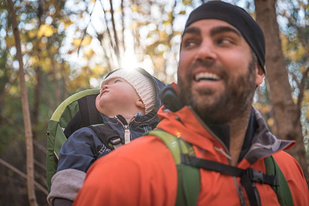 istock Father Backpacking Hiking with Baby in Forest 617585910