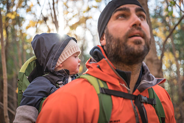 istock Father Backpacking Hiking with Baby in Forest 617586176