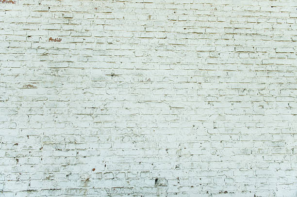 istock Old weathered white brick wall. Vintage texture Background. 617586188