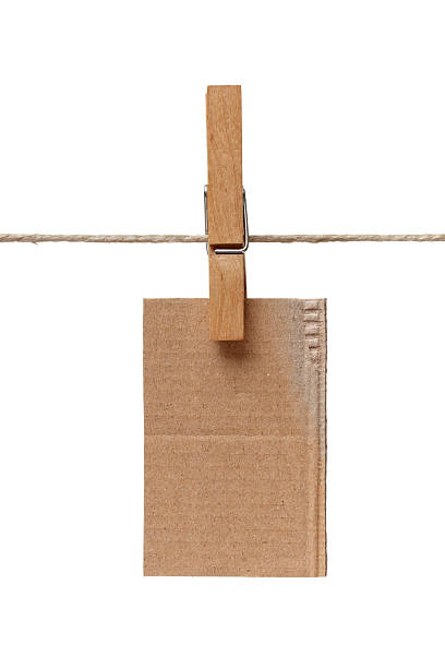 istock clothes peg and note paper on clothes line rope 617587228