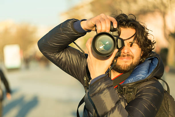 istock Photographer portrait with bokeh background 617588268