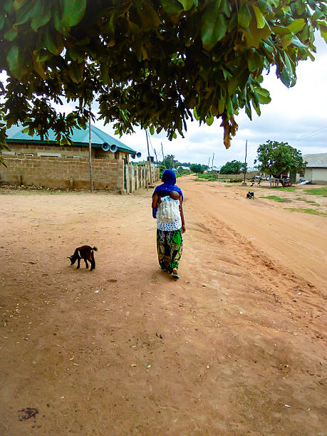 African woman with child on her back