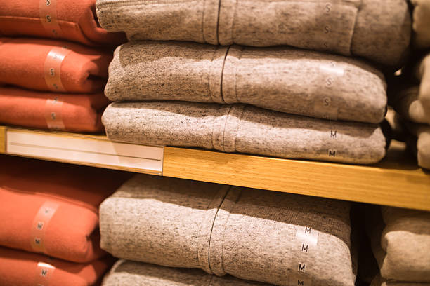istock female  sweater stack in the shelf in the retail market 617593718