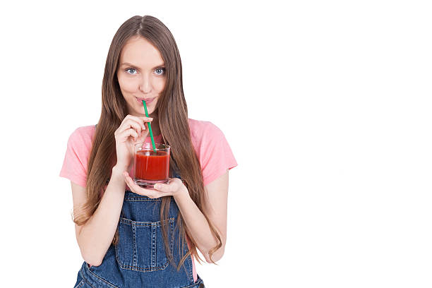 istock Girl with juice isolated 617594028