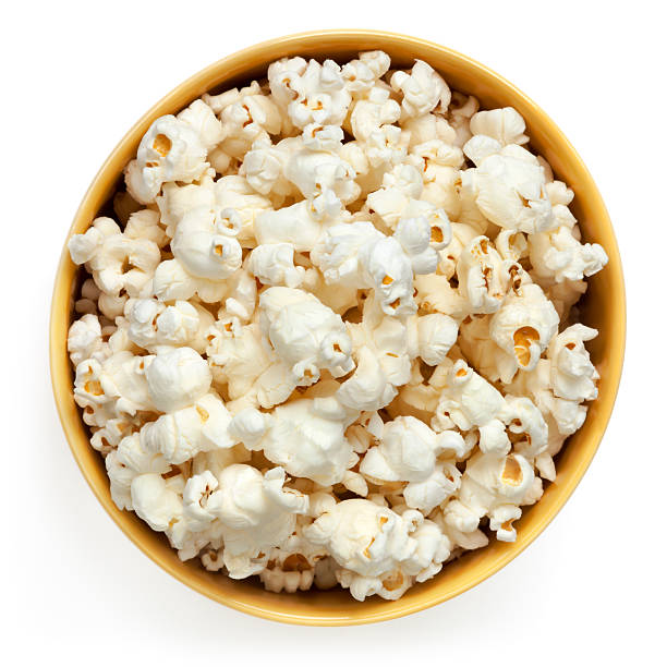 ポップコーンボウルの孤立したトップビュー - popcorn snack bowl corn ストックフォトと画像