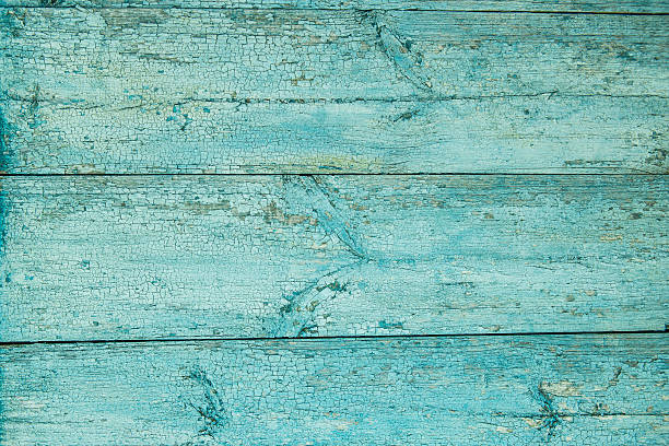 istock Old weathered wood plank painted in blue 617595448