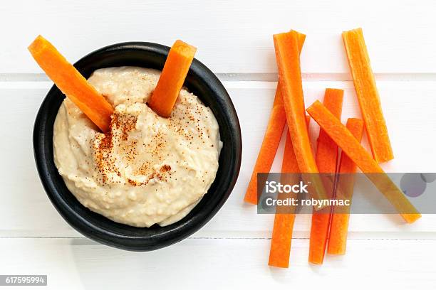 Hummus With Carrot Sticks Top View Stock Photo - Download Image Now - Hummus - Food, Carrot, Vegetable