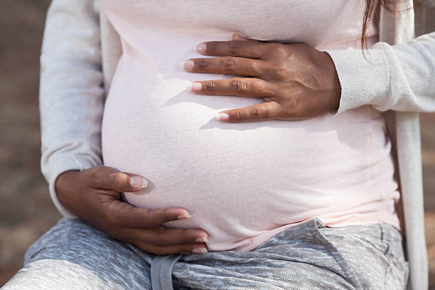 istock Close up pregnant woman's big belly. 617601988