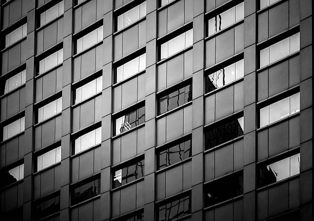 istock windows of business building with B&W color 617602654