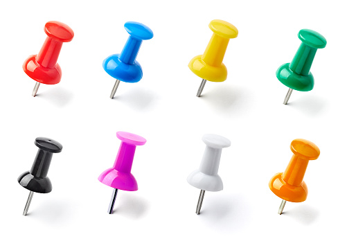 collection of various pushpins on white background. each one is shot separatelyclose up of a pushpin on white background with clipping path