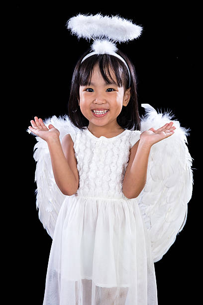 beautiful tender angel girl walks along the seashore