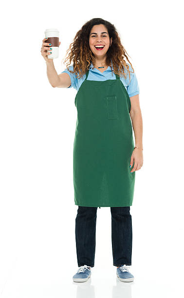 istock Smiling barista holding coffee cup 617608948